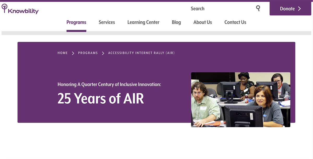 Screenshot of a website. A large, purple banner with a hero image of a group of people working on computers sit next to a title that reads '25 Years of AIR'.